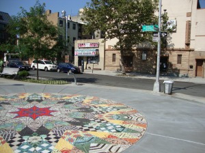 The man's favorite part of the plaza is this mosaic, which was a recent DOT addition. 